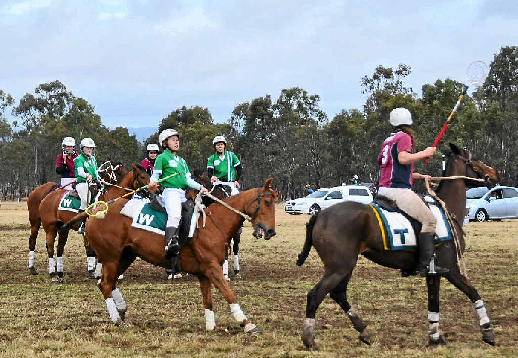 Warwick’s Keely McGrath looks for a way past Tansey’s Sydney Doolan.